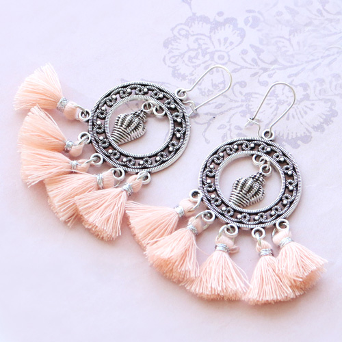 Statement earrings with tassels and matching bracelets and necklaces!