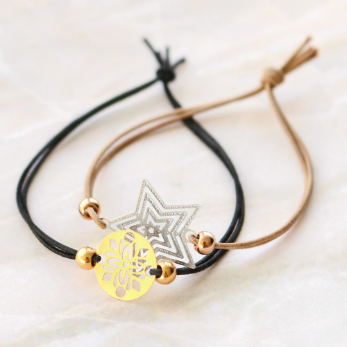 Bracelets and a keychain with bohemian pendants 