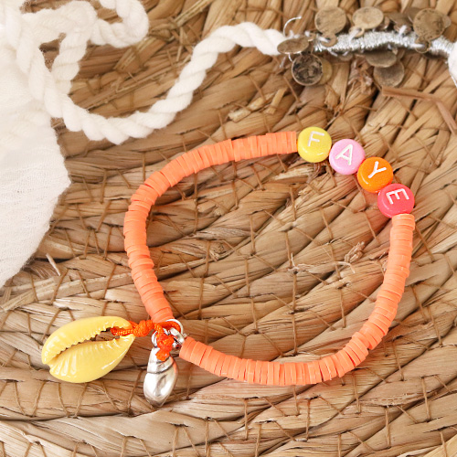 Cheerful jewellery with letter beads, fimo charms, wooden beads and Katsuki beads