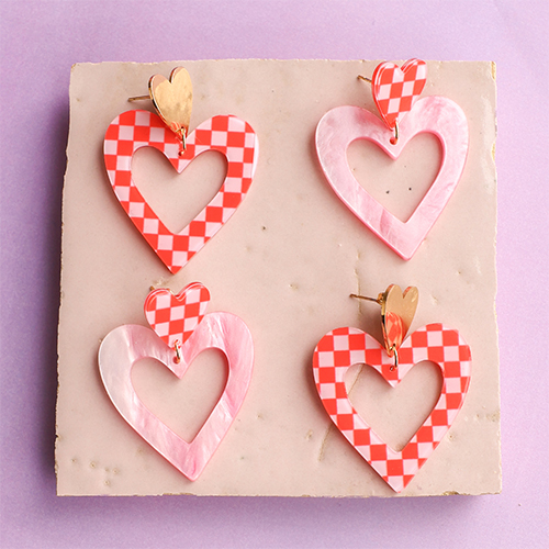 Create stylish earrings with resin pendants and stainless steel charms