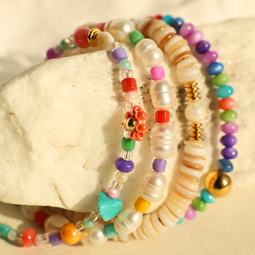 Create a cheerful collection with shell beads
