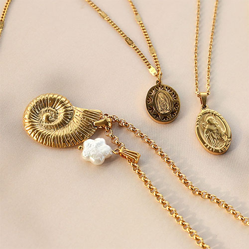 Design statement necklaces with stainless steel charms and pendants