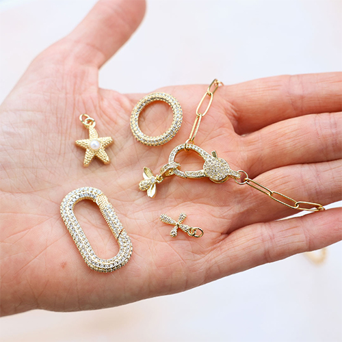 Design trendy jewellery with brass TQ metal charms and locks