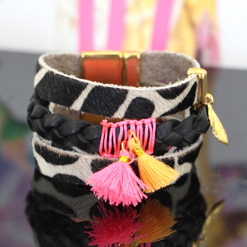 Combine Nature leather with bright coloured tassels and beads!