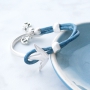 Bracelets and rings with anchors in blue shades