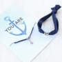 Bracelets and rings with anchors in blue shades