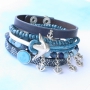 Bracelets and rings with anchors in blue shades