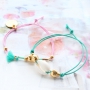 Summery bracelets with coloured elastic cord and colourful beads