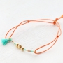 Summery bracelets with coloured elastic cord and colourful beads