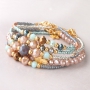 Colourful bracelets of faceted beads with golden details