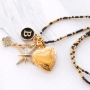 Create festive necklaces with pretty medallion, rhinestone and letter charms