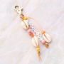 Beach jewellery with wooden beads, shells and DQ European metal