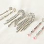 Sparkly bracelets and earrings with rhinestone chain