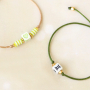 These cool summer bracelets can be made with letter beads and zodiac beads: 