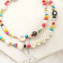 This is how you make the cutest necklaces with different beads and materials: 