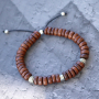 See here how you can make these cool bracelets with wooden beads yourself: 