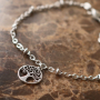Making subtle jewellery with charms of stainless steel