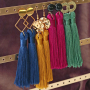 Get inspired! Make trendy earrings with big tassels: