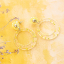 Create statement earrings with resin pendants