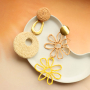 Design necklaces, earrings, and rings with raffia pendants and findings