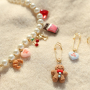 Create joyful bag decorations with Christmas resin pendants