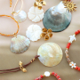 Get creative with large shell pendants and beads