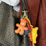 Create the cutest combos with our new bag charms