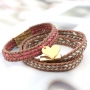 Fashionably bracelets made of waxed cord with different items of Designer Quality metal