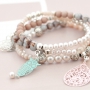 Trendy bracelets and earrings with Bohemian charms and fashionable beads