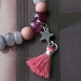 Trendy jewellery made of facet cut natural stone beads in pink and grey shades
