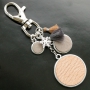 Jewellery and keychains with DQ leather cabochons.