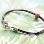 Get creative! Wooden beads with a twist in combination with DQ European leather and DQ European metal