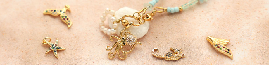 Yes! Discover our new brass TQ metal charms