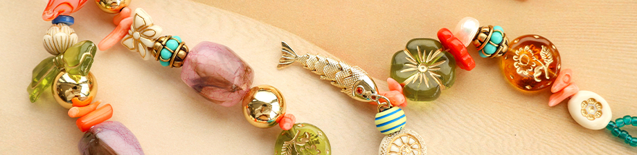 New collection of acrylic beads with gold-tone details New collection of acrylic beads with gold-tone details